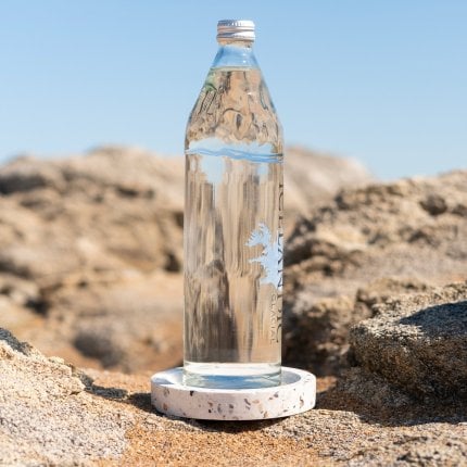 Socle de bouteille en coquillages