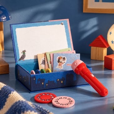 Lampe à histoires Moulin Roty avec livre et disques à projeter
