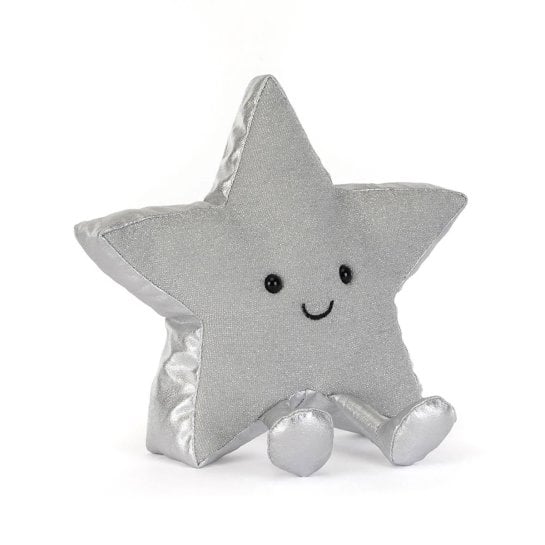 Étoile argentée en peluche à poser sur une étagère pour une touche de magie